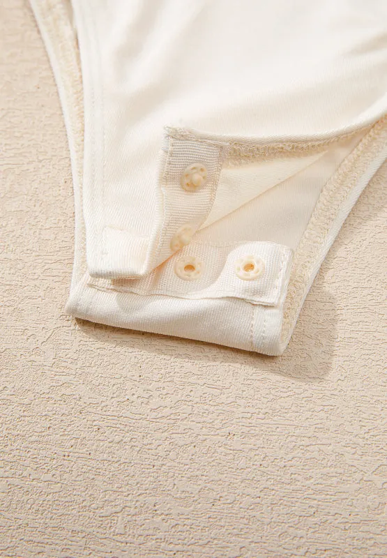 Size Small Ivory Sequin Surplice Long Sleeve Bodysuit