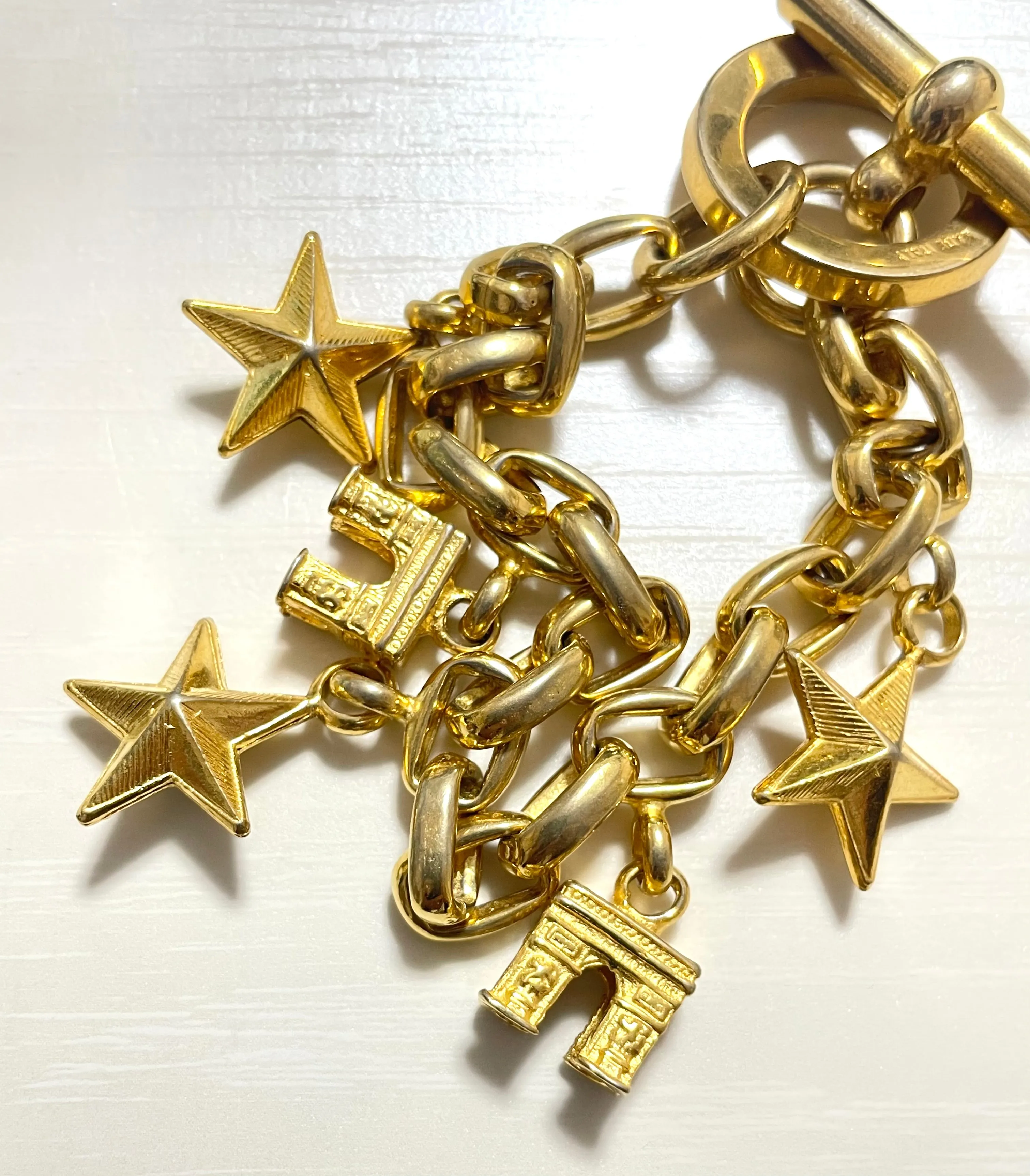Vintage Celine chain bracelet with Triomphe and star charms. One-of-a-kind Celine jewelry. 061224ac1