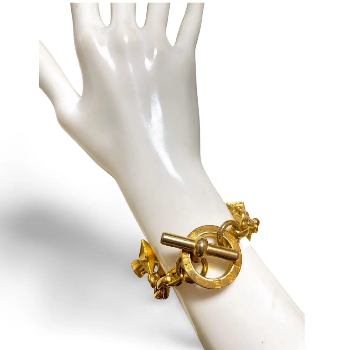 Vintage Celine chain bracelet with Triomphe and star charms. One-of-a-kind Celine jewelry. 061224ac1
