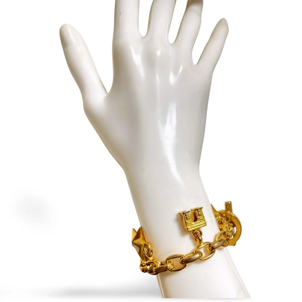 Vintage Celine chain bracelet with Triomphe and star charms. One-of-a-kind Celine jewelry. 061224ac1