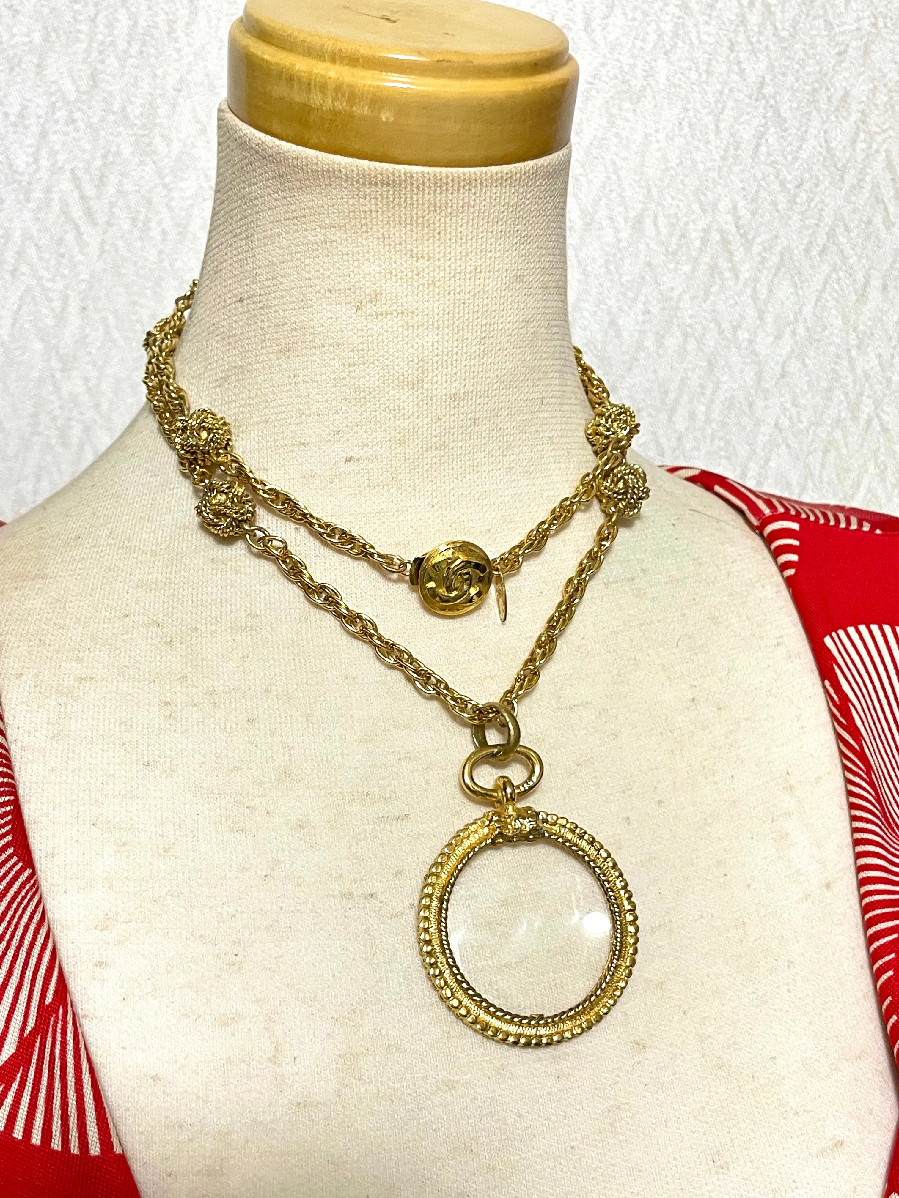 Vintage CHANEL golden chain necklace with loupe glass pendant top and ball charms. Gorgeous masterpiece. 0410131ac