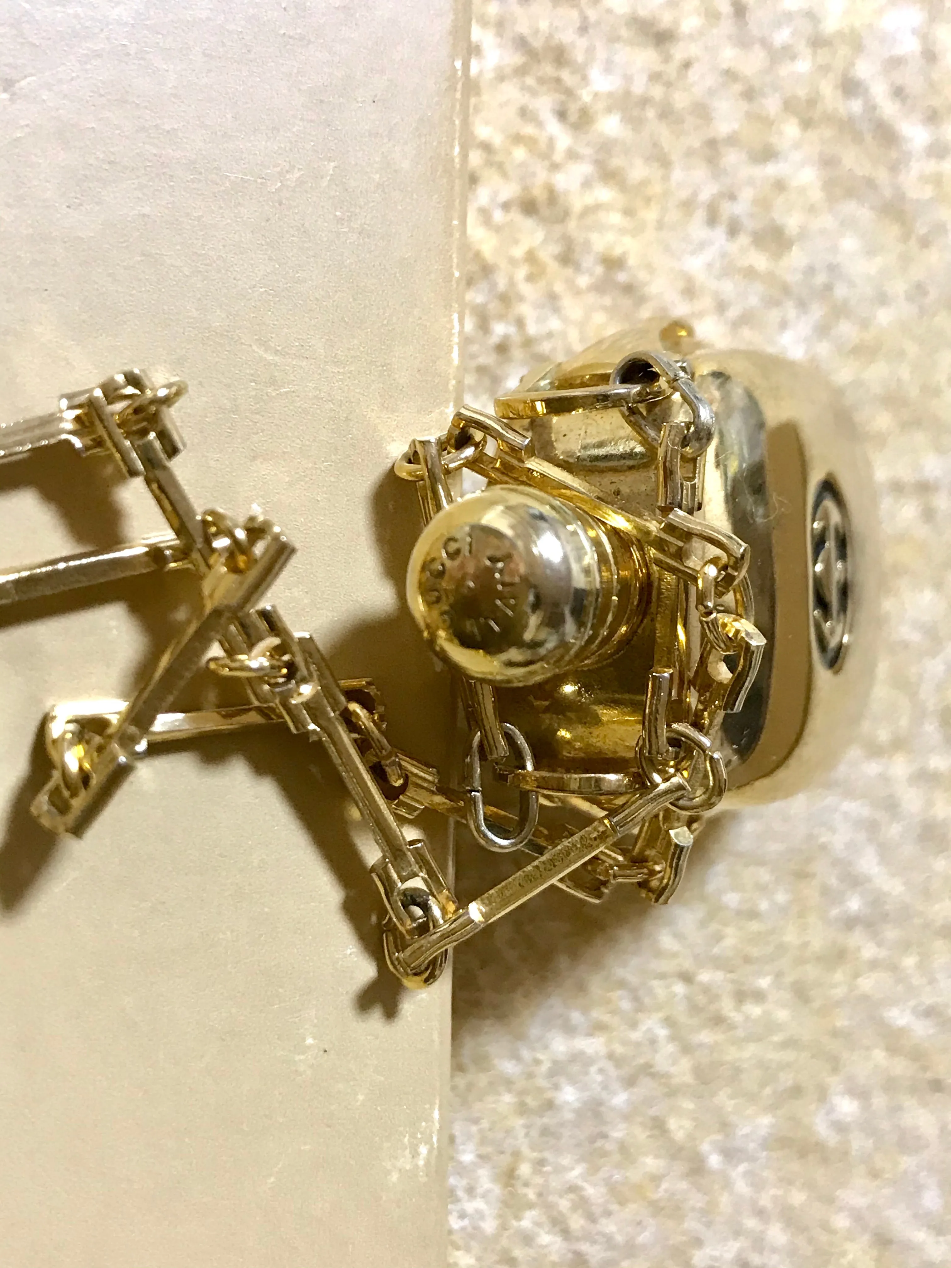 Vintage Gucci golden perfume bottle necklace with logo mark on top. Gorgeous rare masterpiece from 80's. 0410271